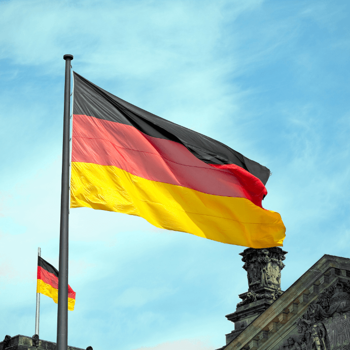 German flag in front of the Reichstag building illustrating VAT registration and business activities in Germany